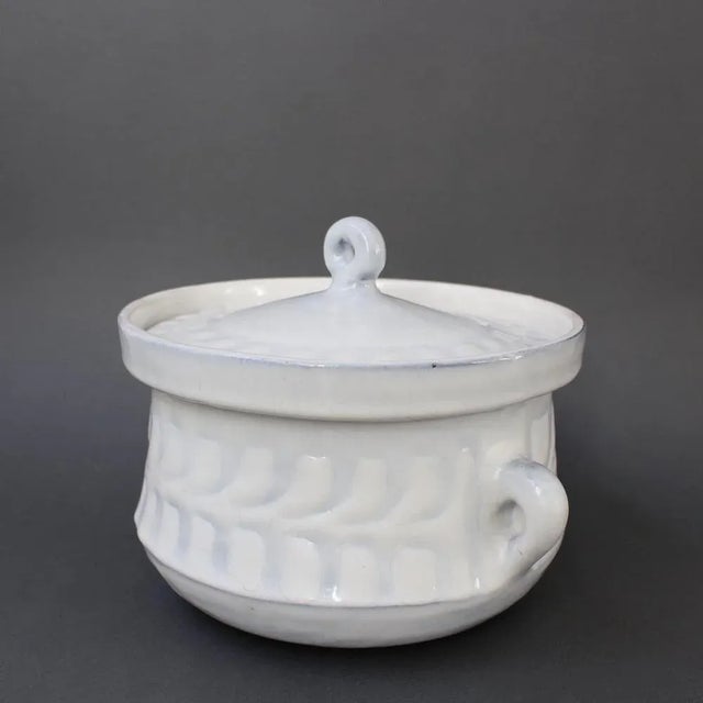 Vintage french ceramic tureen by roger capron (circa 1960s). A luscious creamy white base with subtle grey-blue hues in...