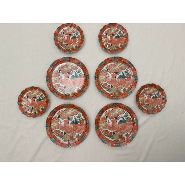 A set of four dinner plates and four salad plates comprise this set Imari Arita Peacock dinnerware. Typical of the...
