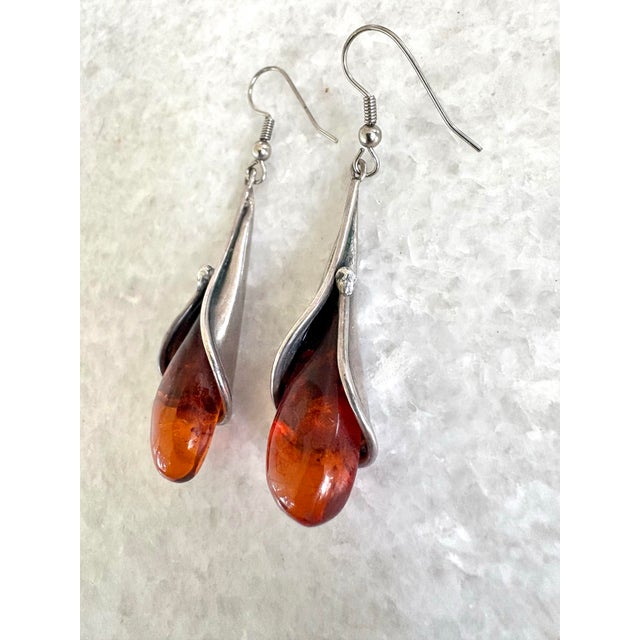 Gorgeous Amber and Sterling silver vintage earrings in a lily teardrop style design.