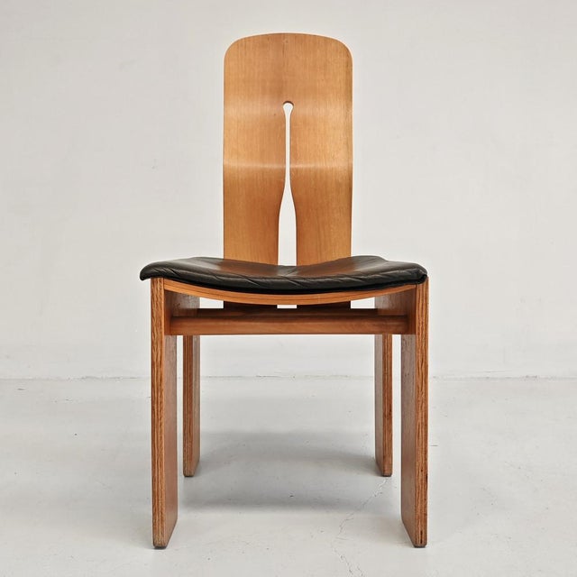 Walnut and Black Leather Model 765 Chair by Carlo Scarpa for Bernini, 1970s, in Very Good conditions. Designed 1970 to...