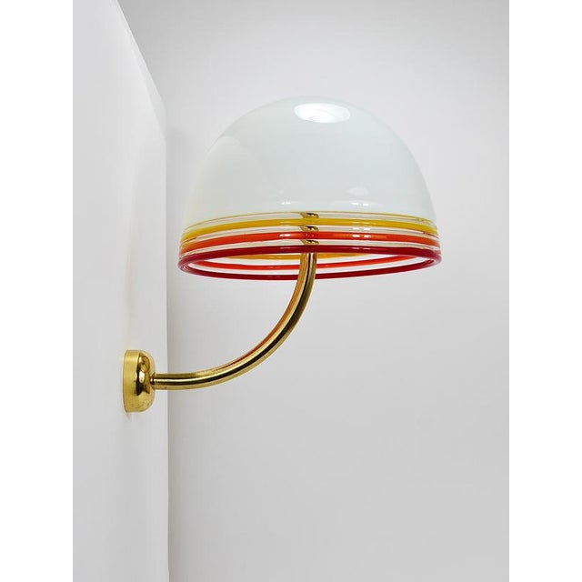 A rare and spectacular pair of wall lights from the 1970s, designed in 1975 by roberto pamio and renato toso for leucos in...