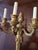 An important large antique pair of French Louis XV style gilded ormolu sconces. Having the finest mercury gilding 24k gold...