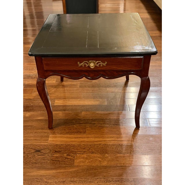 Add timeless elegance and sophisticated contrast to your space with this beautifully refinished vintage Henredon French...