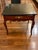 Add timeless elegance and sophisticated contrast to your space with this beautifully refinished vintage Henredon French...