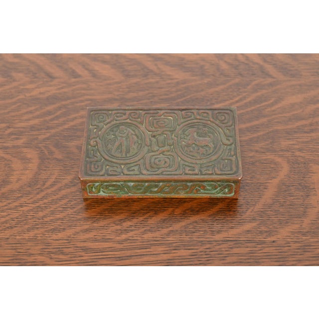 A stunning antique Arts & Crafts period bronze desk box, jewelry box, or decorative box featuring Zodiac designs By...