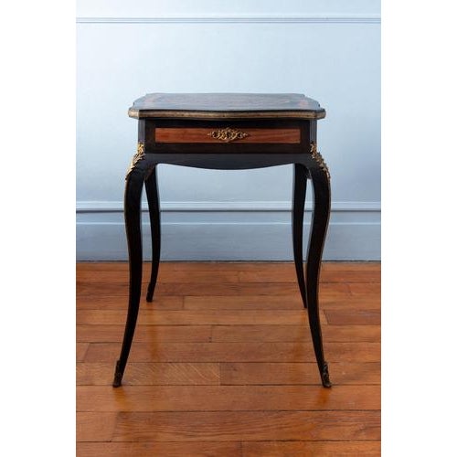 Height: 70.5 cm Width: 51 cm Depth: 36 cm Some parquetry losses to tabletop and legs, minor crack to tabletop, now...