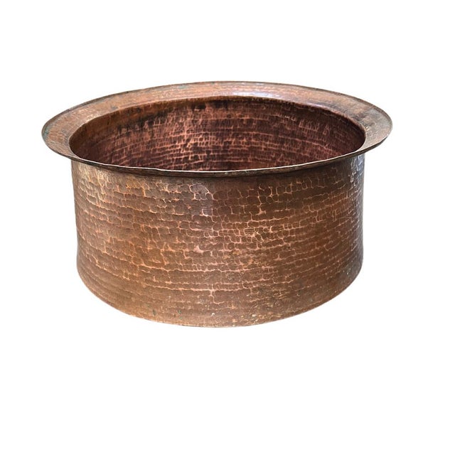 This vintage planter from Indonesia is a decorative and functional container crafted from copper, known for its distinct...