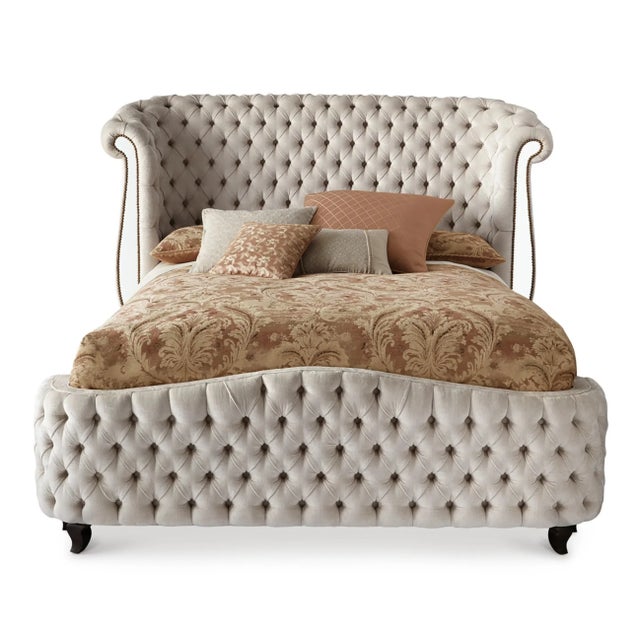 Magnificent, curvaceous, deeply tufted, Haute House King-size Bed. The bed has side rails, slats, and hardware still...