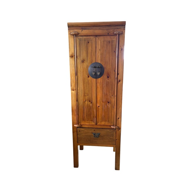 Elegant vintage Chinoiserie Cantonese armoire handcrafted from solid elm wood, embodying Ming dynasty simplicity with...