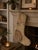 This vintage wool kilim stocking has a soft, sun-faded ivory ground with just a whisper of rust brown pattern remaining...