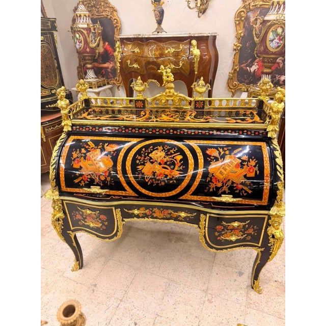 An extraordinary oversized French Rococo-style secretary / writing bureau, designed as a true statement piece with...