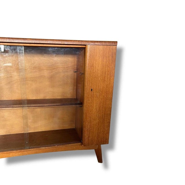 Mid-Century Drinks Cabinet in Teak with Glass Sliding Doors and Adjustable Shelf For Sale - Image 5 of 11