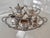 A handsome and complete six-piece tea and coffee service by Gorham in the "Shell & Gadroon" pattern, silverplate. This is...