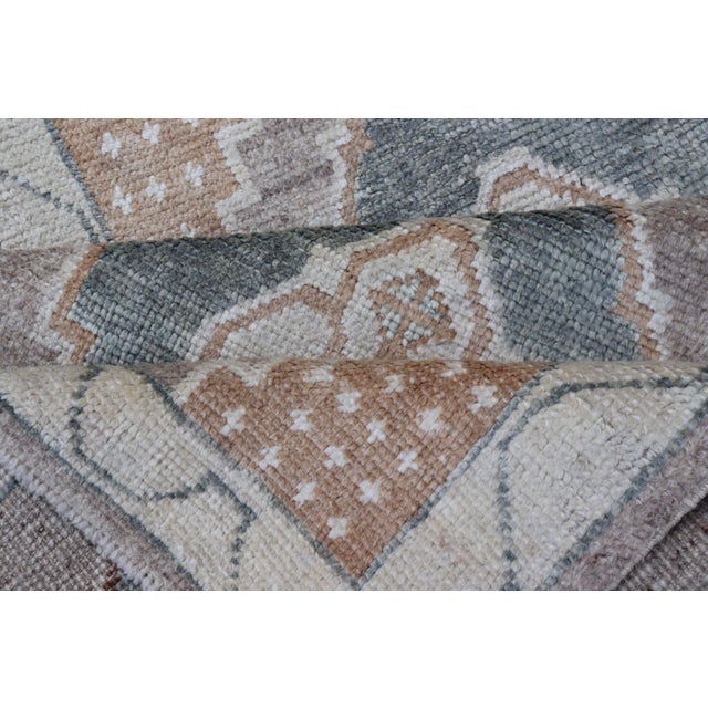 Long Turkish Oushak Runner With Soft Green Field and Beige Medallions For Sale - Image 15 of 16