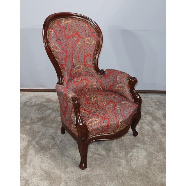 Rare shepherdess in solid mahogany of small small, having an enveloping shape and a polychrome fabric with stylized floral...