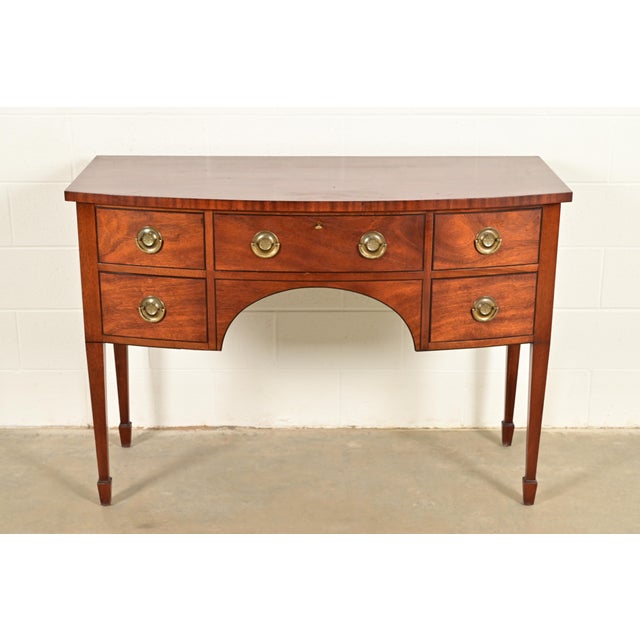 A gorgeous Federal or Hepplewhite style sideboard, credenza, or buffet server In the manner of Baker Furniture USA, Circa...