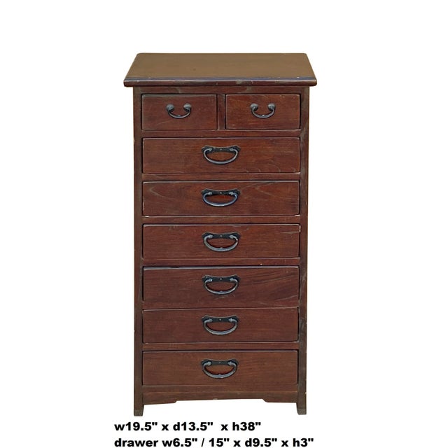 This is a handmade Chinese oriental medium brown stain color slim chest of drawers files cabinet. There are eight...