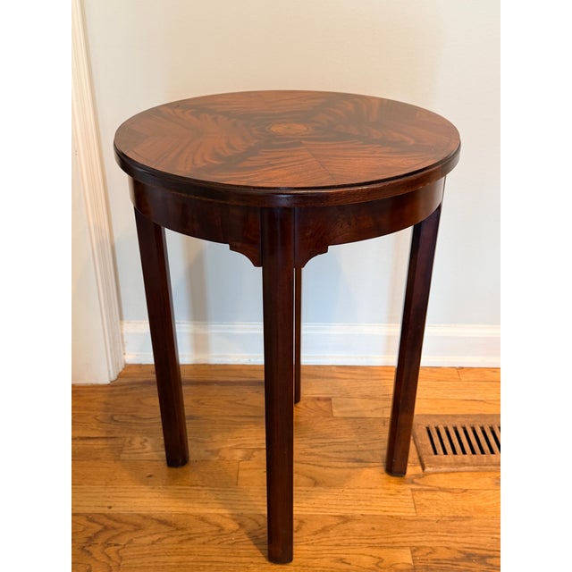 Very pretty little flame mahogany antique inlaid table with lovely apron. Perfect size table for a tight space for a lamp...