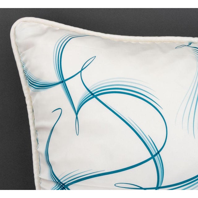 Two Hermes "24 Faubourg" Silk Pillows, in blue and rainbow with down goose feather pillows. 25" H x 25" W x 8" D....