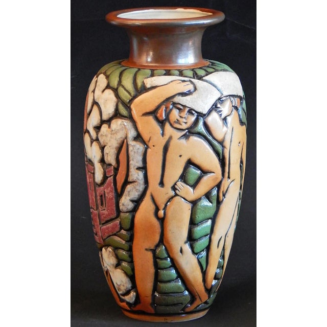 A large and striking Art Deco vase sculpted by Gaston Goor for the Mougin pottery works in France, this brilliantly-hued...