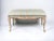 This is a sweet bench! It is an Italian piece with hand painted scrolling shells and vintage striped floral chintz cotton....
