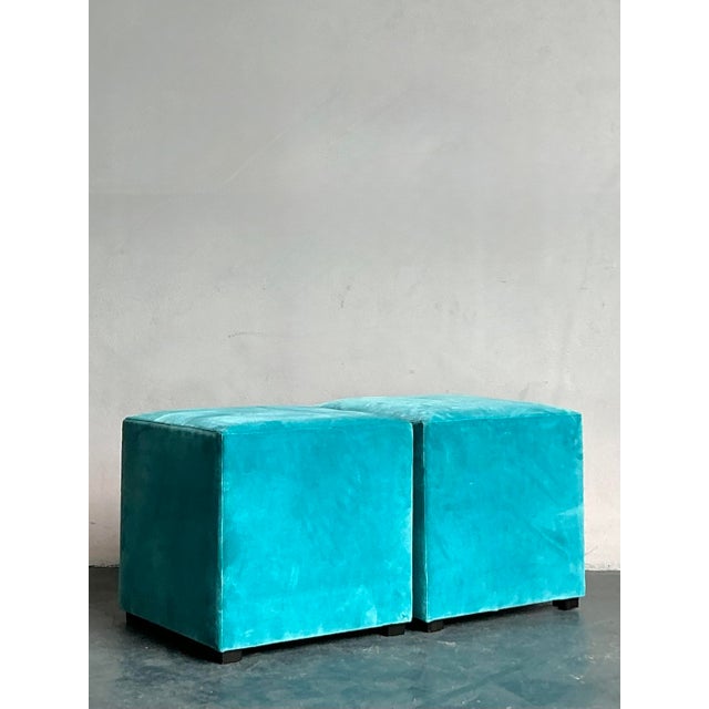 Introduce a touch of luxurious comfort and versatile style with this elegant pair of vintage cube ottomans, reminiscent of...