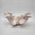 This hand-sculpted pottery bowl exudes elegance and grace. Its organic form echoes nature, making it a stunning...