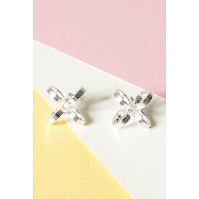 Lovely silver earrings by Cecilia Johansson decorated with silver hoops in a creative design with a voluminous look....