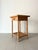 A naive handmade antique pine two tier side table. This scratch built piece has a rustic aesthetic with hand carved...