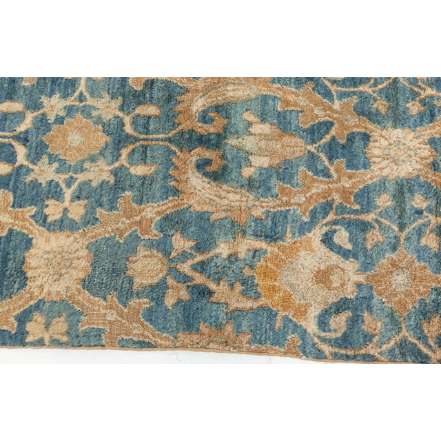 This exquisite Antique Persian Mashad runner, dating back to the 1920s, presents a captivating fragment of traditional...