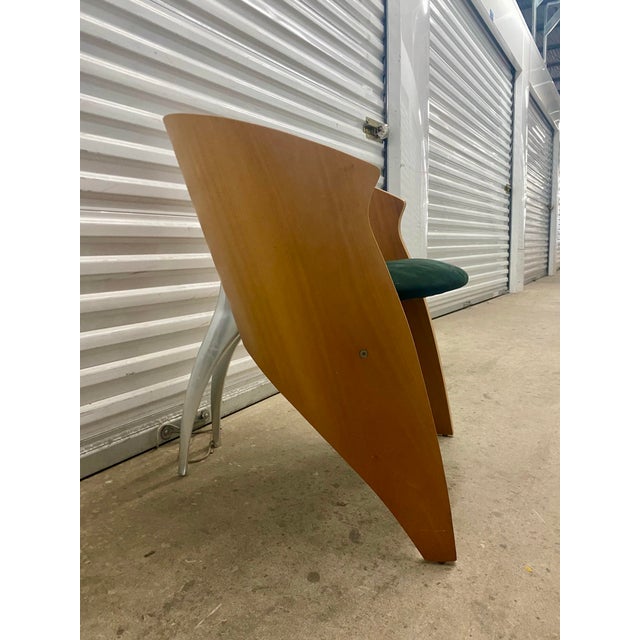 Postmodern a sculptural piece designed in the early 1990s Italy . It is characterized by its distinctive curved plywood...