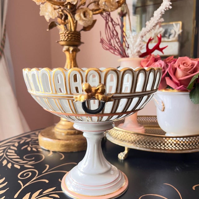 This is SUCH a beautiful antique Old Paris Porcelain compote. Hand-painted gold bows and pretty peachy pink and red...