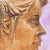 A Modernist study of the artist's model, shown in profile and contrasted against a variegated lavender background. Created...