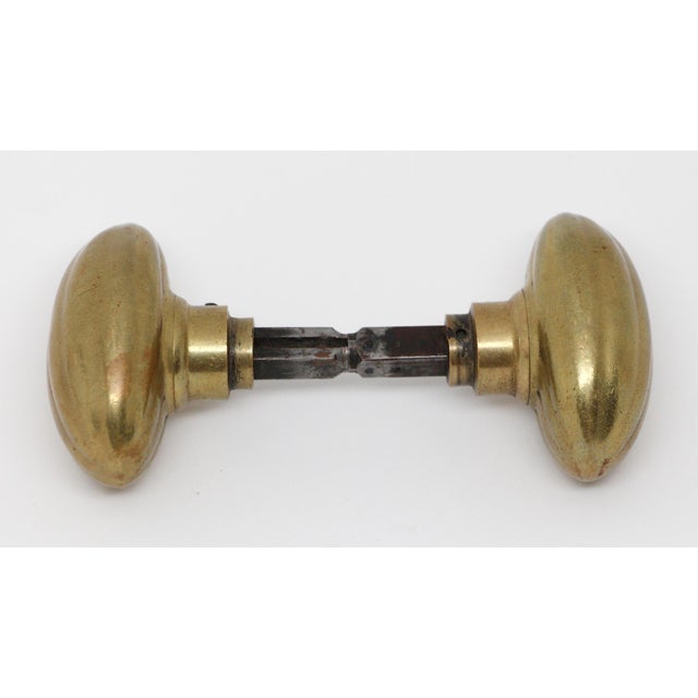 Oval door knobs are made of brass in a polished finish. The manufacturer and date of creation is unknown. Priced as a pair...
