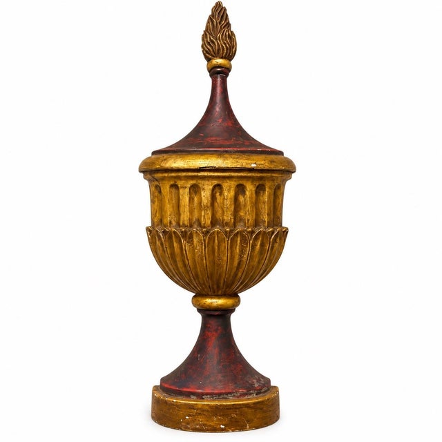 This is a large scale Italian neo-classical style gilt and gesso wall mounted urns. They appear to be gilt and painted...