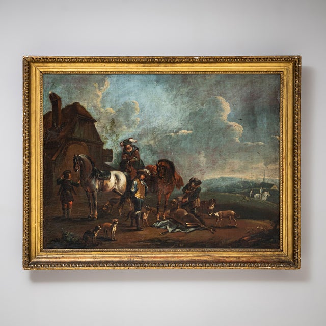 Oil painting depicting a vivid hunting scene with a mounted party, accompanied by hunting dogs and a slain doe in the...