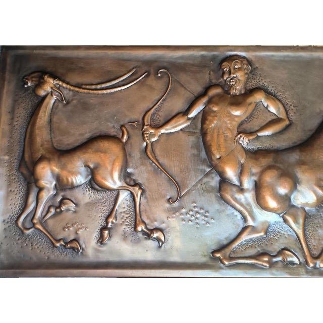 Decorative panel in embossed copper, Signature: CELLINI (Pesaro) 1969 Italy "Centaur hunting with a bow" - The centaur (in...
