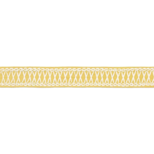 Created in collaboration with Mary McDonald, Tikki Tape is a substantial trim with a graphic crisscross pattern...