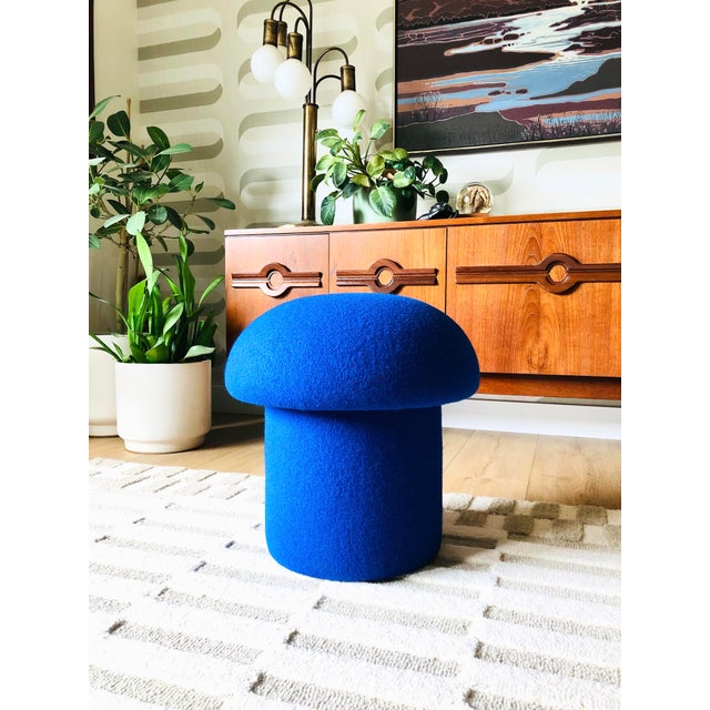 A handmade mushroom shaped ottoman, upholstered in "Cobalt" blue wool fabric. Perfect for using as a footstool or extra...