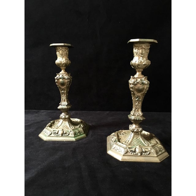 19th century antique Rococo style brass candle sticks with nice patina. Wear consistent with age and use.