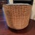 Add a touch of coastal charm and retro comfort to your space with this vintage wicker barrel chair. Featuring a unique...