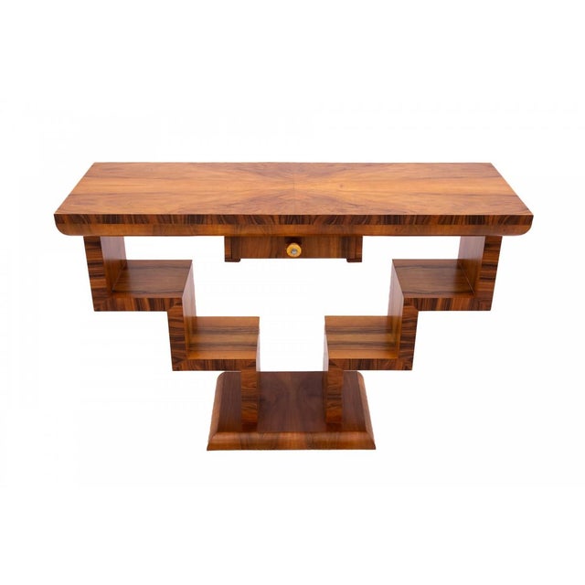 Art Deco console table with a geometric design. Excellent condition; professionally restored. Wood: Walnut Dimensions: H...