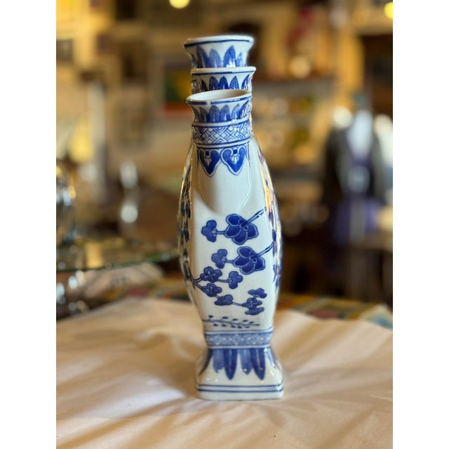 Reproduction Chinese blue and white tulip vase also know as a tulipiere which originated in 1700s Netherland