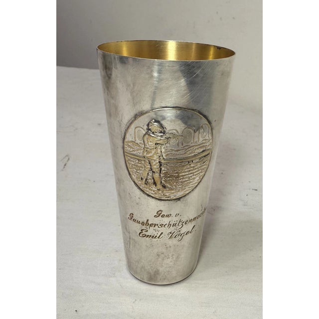 This rare antique silverplate trophy cup is awarded to World War II German General Emil Vogel. It features hand angered...