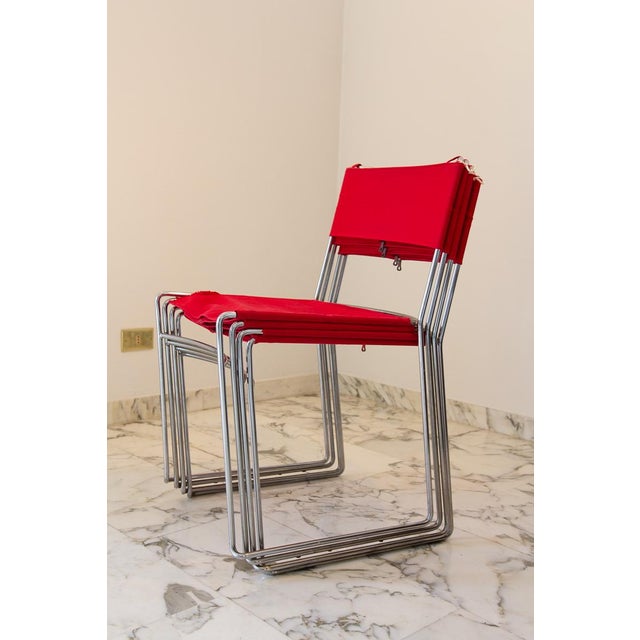 In 1974 Enzo Mari designed the archetypal stackable chair Delfina for Driade. The essential structure is made of chromed...