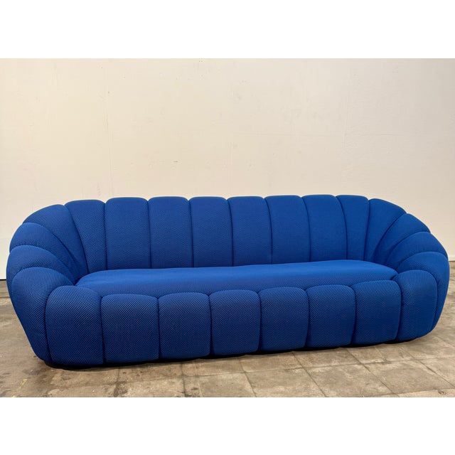 The Bolla sofa is a powerful example of radical Italian design from the 1970s, distinguished by its enveloping, bubble-...