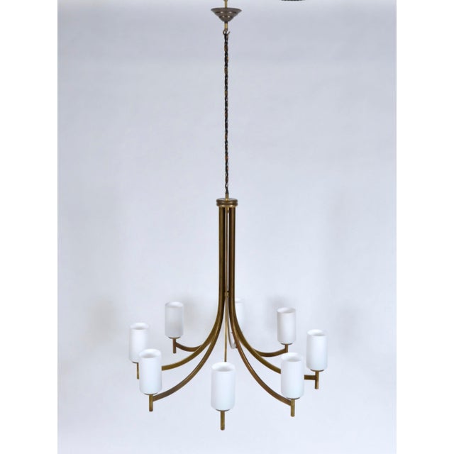 This midcentury italian brass chandelier of large proportions - reportedly from a hotel in turin - is of stunning quality...