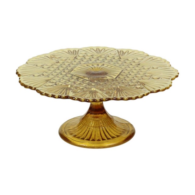 Beautiful large vintage amber-colored cake stand, cake platter, or platter with a floral and diamond pattern, featuring an...