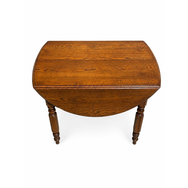 1940s Antique Solid Oak Extension Dining Table With 6 Original Leaves & Original Wooden Casters Circa 1940s–1950s For Sale - Image 5 of 7