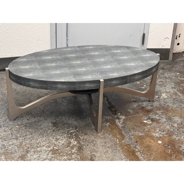Design Plus Gallery presents the Dexter Coffee Table from Made Goods. The coffee table has an oval faux-shagreen top and...
